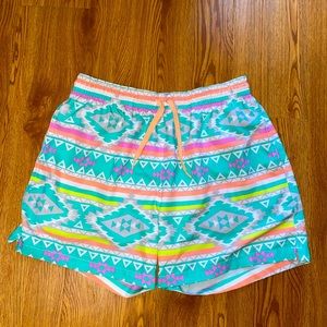 The En Fuegos 5.5" Stretch (Zipper Back Pocket)